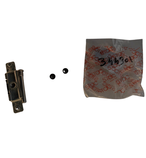 Metal lock component, two black screws, and a plastic bag with text on a white background
