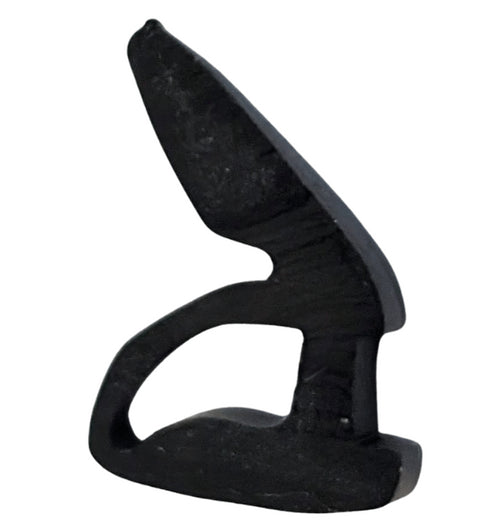 Black plastic tool on a white background