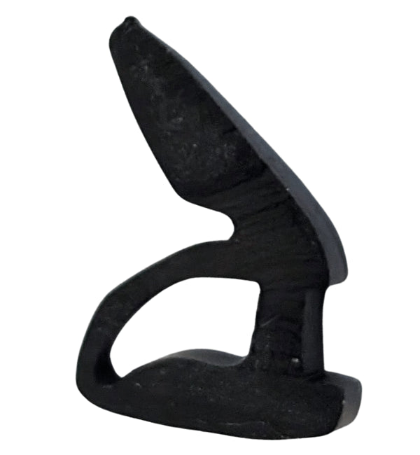 Black plastic tool on a white background