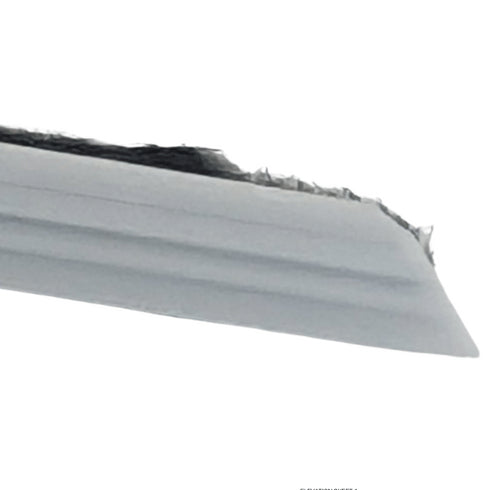 Close-up of a car bumper with visible damage on a white background