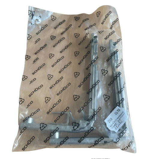 Packaged metal components with Schuco branding on a white background