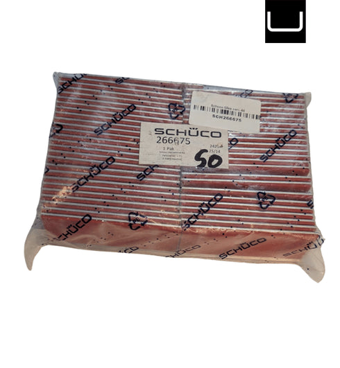 Packaged product with Schüco branding on a white background