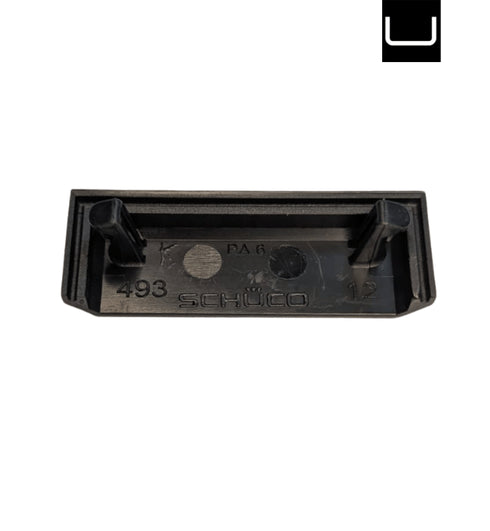 Black plastic component with 'Schuco' branding on a white background