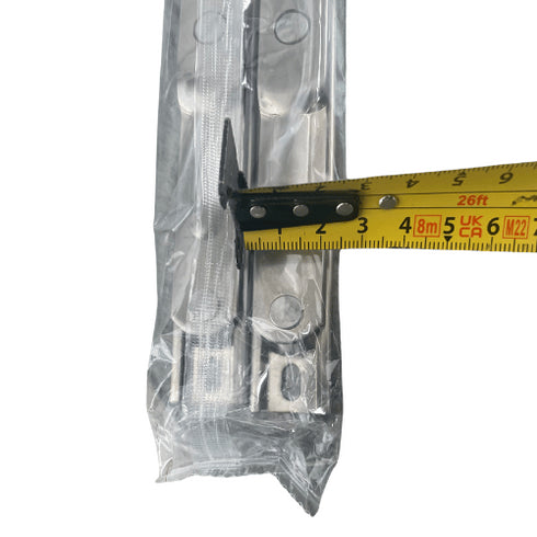 Metal bracket in a clear plastic bag with a measuring tape indicating its length.