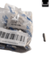 Packaged metal component with a barcode label on a white background