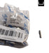 Packaged metal component with a barcode label on a white background