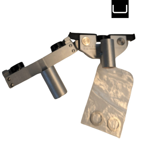 Metal tool with a rectangular head and cylindrical handle on a white background