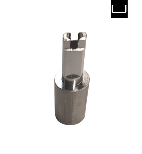 Metal tool or component on a white background