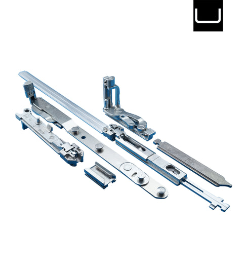 Set of metal door hardware components on a white background