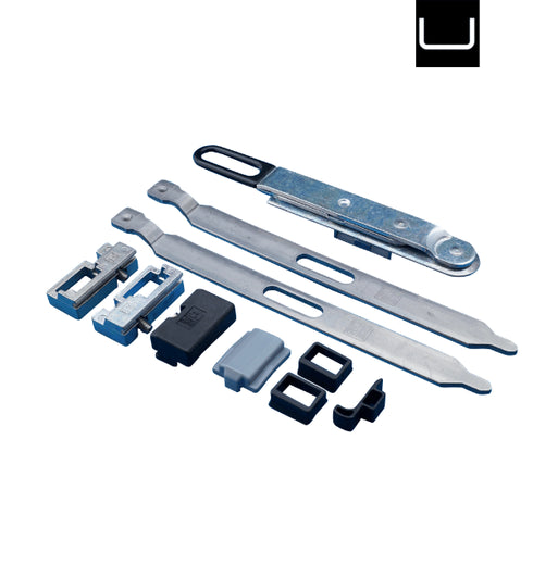 Set of metal tools and components on a white background