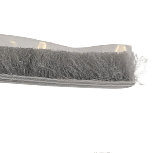 Gray scrub brush with bristles on a white background
