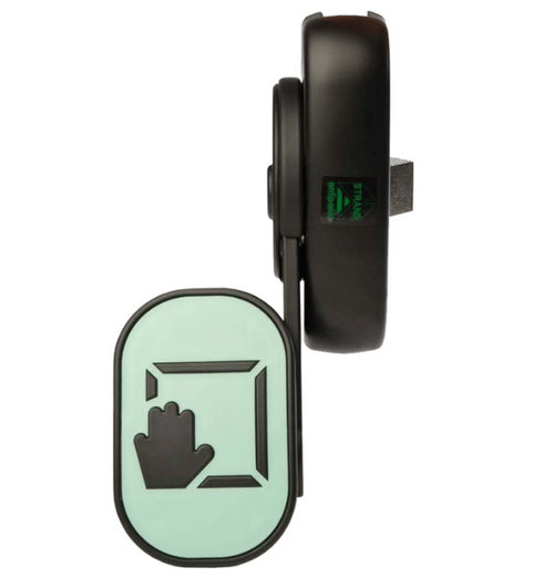 Glowing green and black device with a hand icon on a white background