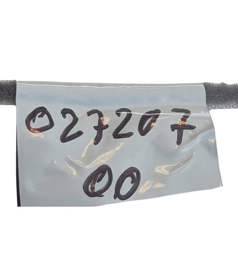 Clear plastic bag with handwritten numbers on a white background