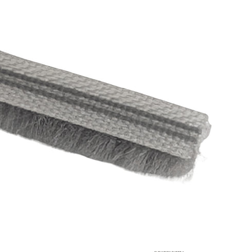 Gray scrub brush on a white background